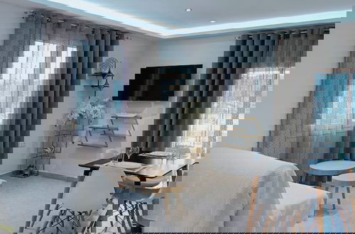 Foto 5 - SkyFrame Apartments