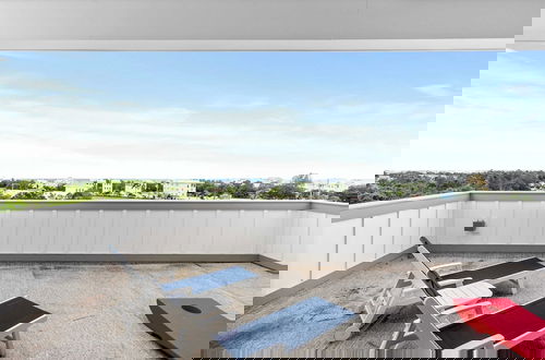 Photo 52 - Rooftop Deck w/ Ocean View, Pool, Walk to Beach! Coastal Canopy by Avantstay