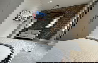 Foto 1 - London Studios and Suites