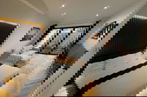 Foto 18 - London Studios and Suites