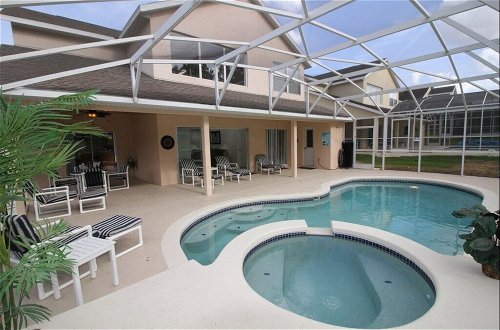 Photo 20 - Games Room, Pool, Spa Large Pool Area! 5 Bedroom Home by RedAwning
