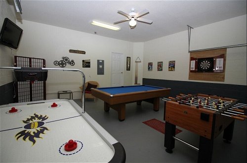 Photo 21 - Games Room, Pool, Spa Large Pool Area! 5 Bedroom Home by RedAwning