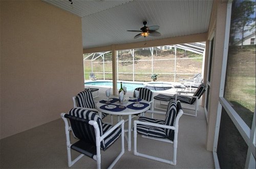 Photo 11 - Games Room, Pool, Spa Large Pool Area! 5 Bedroom Home by RedAwning