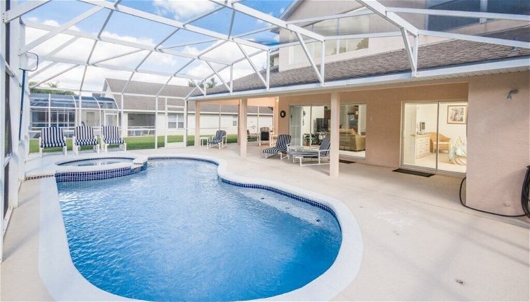 Photo 1 - Games Room, Pool, Spa Large Pool Area! 5 Bedroom Home by RedAwning