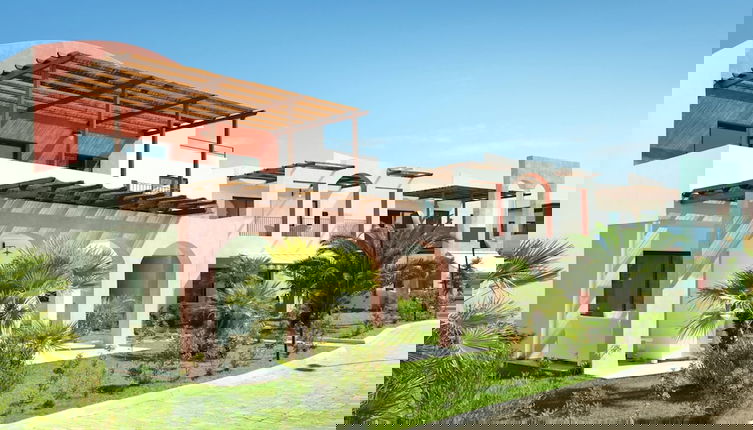 Foto 1 - Comfortable Apartment With AC Near the Beach