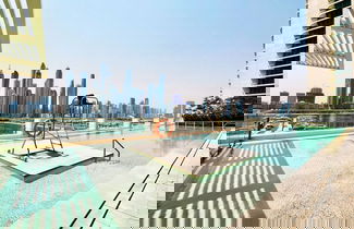 Foto 3 - Modern 2BR Emaar Beachfront w Pvt Beach Access