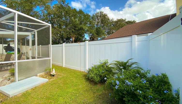 Photo 1 - 3 Bedroom Home With Private Screened Pool With Rock Waterfall Feature and Gameroom by Florida Dream Homes