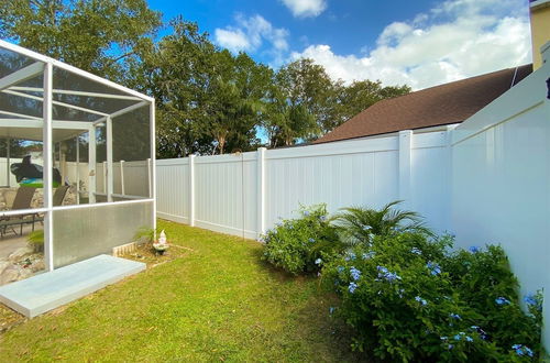 Photo 1 - 3 Bedroom Home With Private Screened Pool With Rock Waterfall Feature and Gameroom by Florida Dream Homes