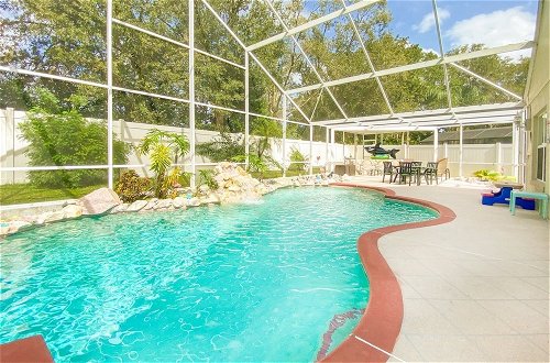 Photo 50 - 3 Bedroom Home With Private Screened Pool With Rock Waterfall Feature and Gameroom by Florida Dream Homes