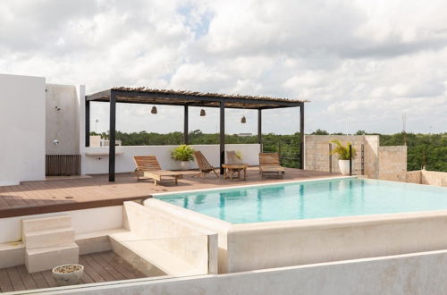 Photo 20 - Modern 4BR Apartment La Veleta Rooftop Pool Amazing Amenities Incredible Jungle View