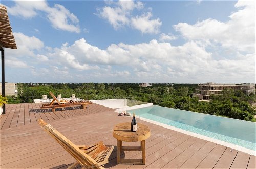 Foto 3 - Modern 4BR Apartment La Veleta Rooftop Pool Amazing Amenities Incredible Jungle View