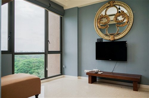 Photo 3 - Minimalist 1Br With Study Room At Marigold Nava Park Apartment
