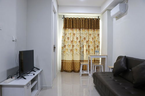 Photo 9 - Comfort And Minimalist 2Br At Daan Mogot City Apartment