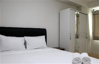 Photo 3 - Comfort And Minimalist 2Br At Daan Mogot City Apartment