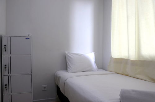 Photo 2 - Comfort And Minimalist 2Br At Daan Mogot City Apartment