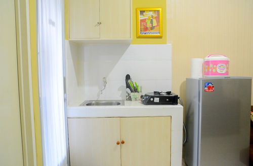 Photo 11 - Comfy 2BR Green Bay Pluit Apartment