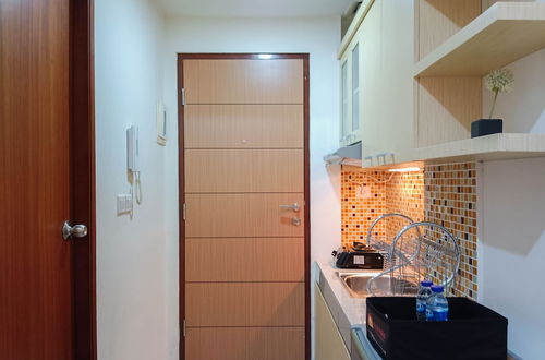 Photo 9 - Tranquil Studio At Vida View Makassar Apartment