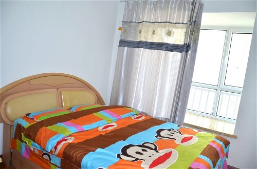Foto 5 - Lanzhou Longshang Mingzhu Apartment Two-bedroom suite