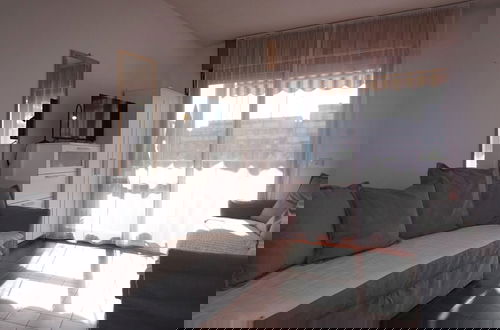 Foto 3 - Cozy Studio With Shared Pool