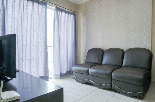 Photo 2 - Strategic for 4 Pax 2BR City Home Apartment near MOI