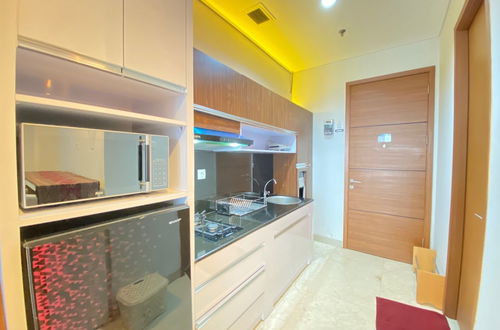 Photo 13 - Pleasant 1Br Deluxe At Dago Suites Apartment Near Itb