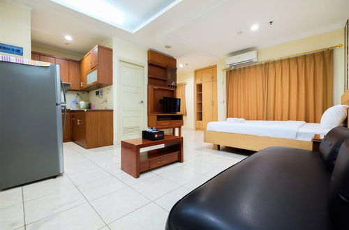 Photo 3 - Simply Spacious Studio Room at City Home Apartment near Kelapa Gading