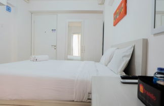 Photo 3 - Tidy Studio Apartment at Bassura City near Shopping Mall