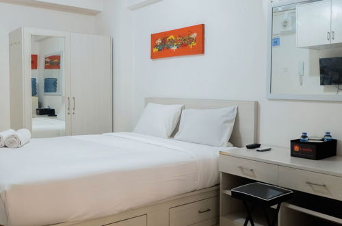 Photo 15 - Tidy Studio Apartment at Bassura City near Shopping Mall