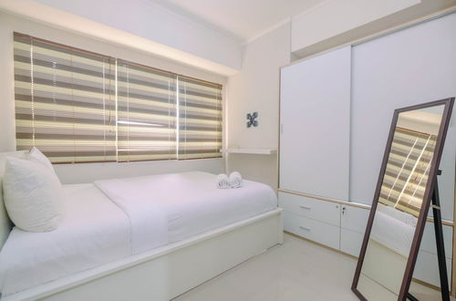 Photo 5 - Minimalist and Posh 1BR The Oasis Cikarang Apartment