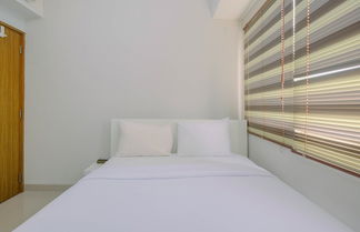 Photo 2 - Minimalist and Posh 1BR The Oasis Cikarang Apartment