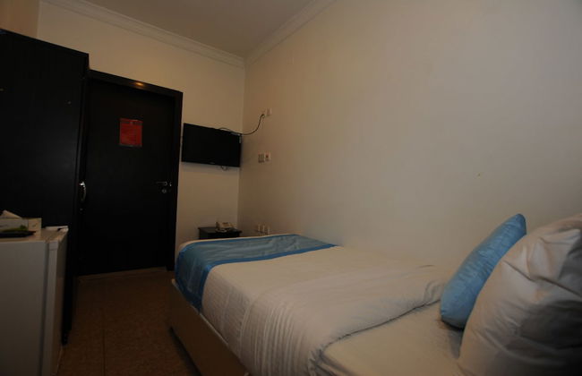 Al Muhanna Plaza Hotel - Photo 9