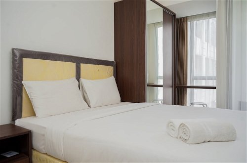 Photo 1 - Comfort And Warm Studio Room Apartment At M-Town Residence