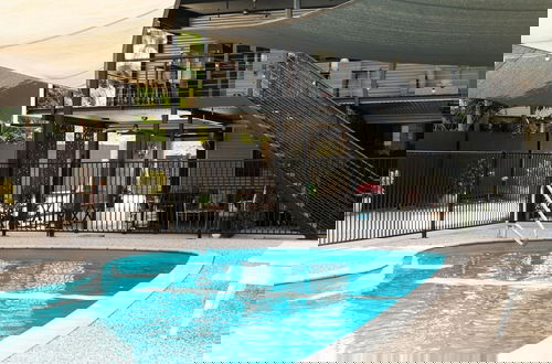 Photo 4 - Rosewood Rustic Refuge Pool Outdoor Dining Backyard