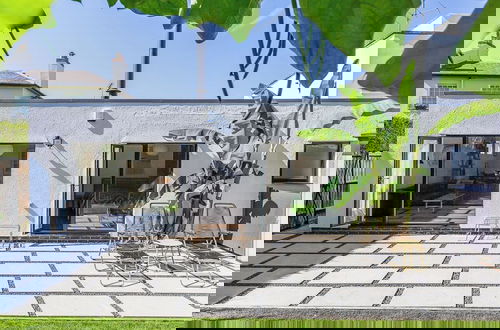 Foto 1 - Mid-Century Modern Style 1BD with Garden