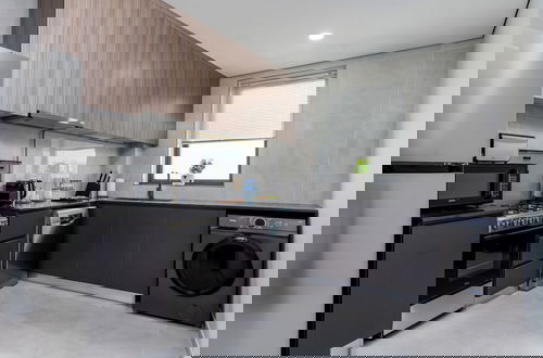 Foto 6 - Waves - Stylish 1BR Close to IMG World & Global Village
