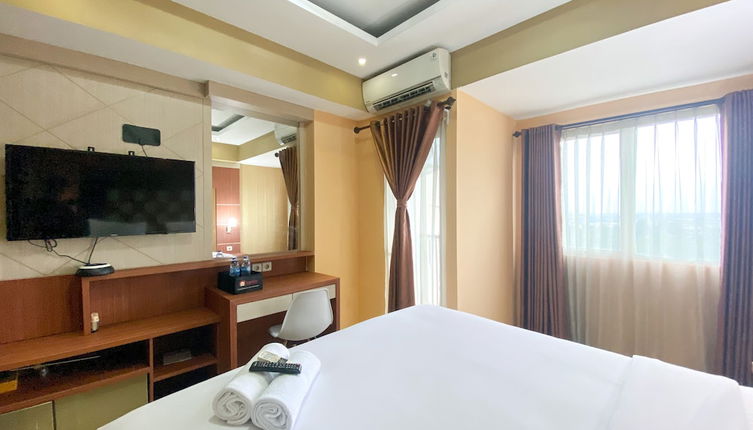 Photo 1 - Cozy Studio Room At Oasis Cikarang Apartment