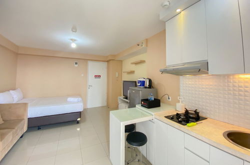 Foto 6 - Cozy Studio At 30Th Floor Bassura City Apartment