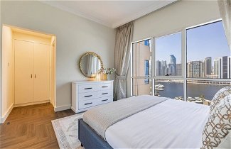 Foto 2 - Stylish 1br + Extra Bed With Burj Khalifa View