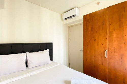 Foto 3 - Restful And Tidy 2Br At 21St Floor Meikarta Apartment