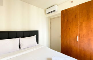 Foto 3 - Restful And Tidy 2Br At 21St Floor Meikarta Apartment
