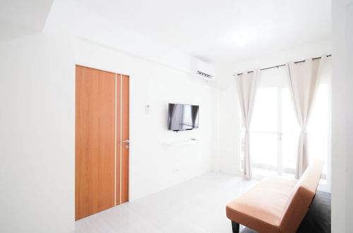 Photo 17 - Best Choice And Homey 2Br At Puncak Dharmahusada Apartment