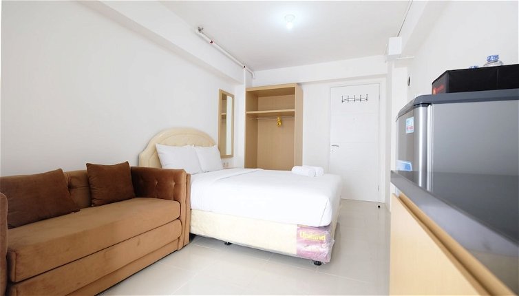 Photo 1 - Affordable Studio with Sofa Bed at Bassura City Apartment