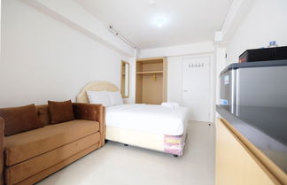 Photo 1 - Affordable Studio with Sofa Bed at Bassura City Apartment