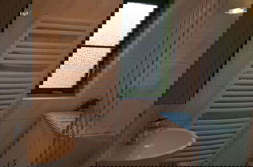 Foto 11 - 