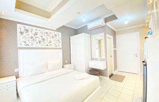 Photo 3 - Nice Studio Room At Grand Asia Afrika Apartment