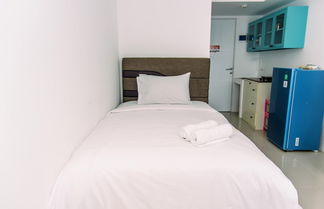 Foto 3 - Cozy And Warm Studio At Urbantown Serpong Apartment