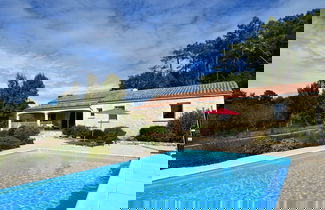 Foto 1 - Holiday Home in Montclera With Sunny Garden, Playground Equipment and Private Pool
