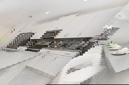 Foto 15 - Storey Lake Home In Amazing Resort With Lazy River 4 Bedroom Townhouse by RedAwning