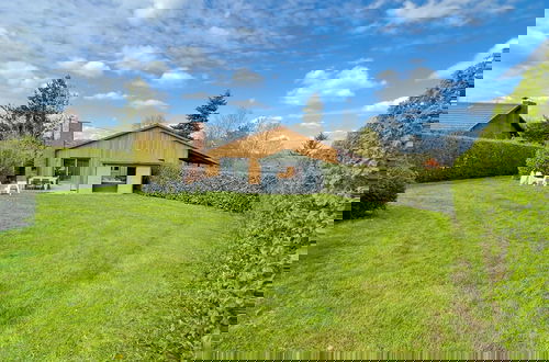 Foto 12 - Holiday Home with Terrace, Garden, BBQ, Sauna & Hot Tub