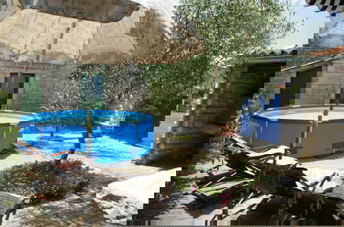 Photo 31 - Stone Holiday Home in Peresiji With Pool